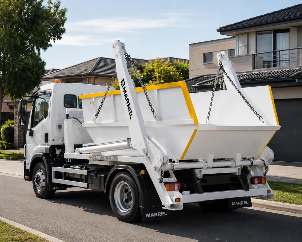 Spartan Bins truck delivering a skip bin in a Melbourne suburb